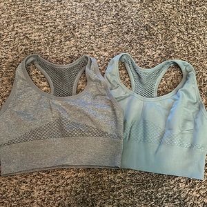 2 pack size M pro-fit sports bras